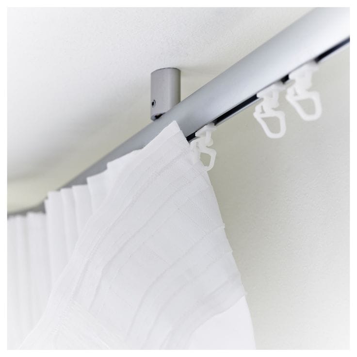 IKEA KVARTAL curtain system. Popular ceiling-mounted rail setup.