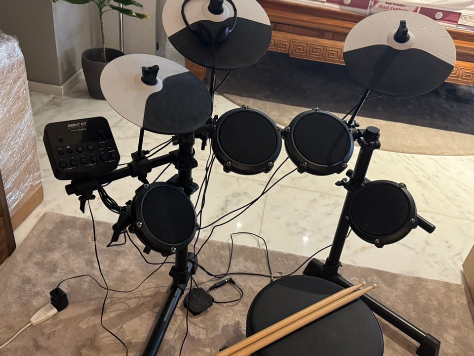 Alesis Debut Kit Mesh-head electronic drum kit with Seat & Drum sticks